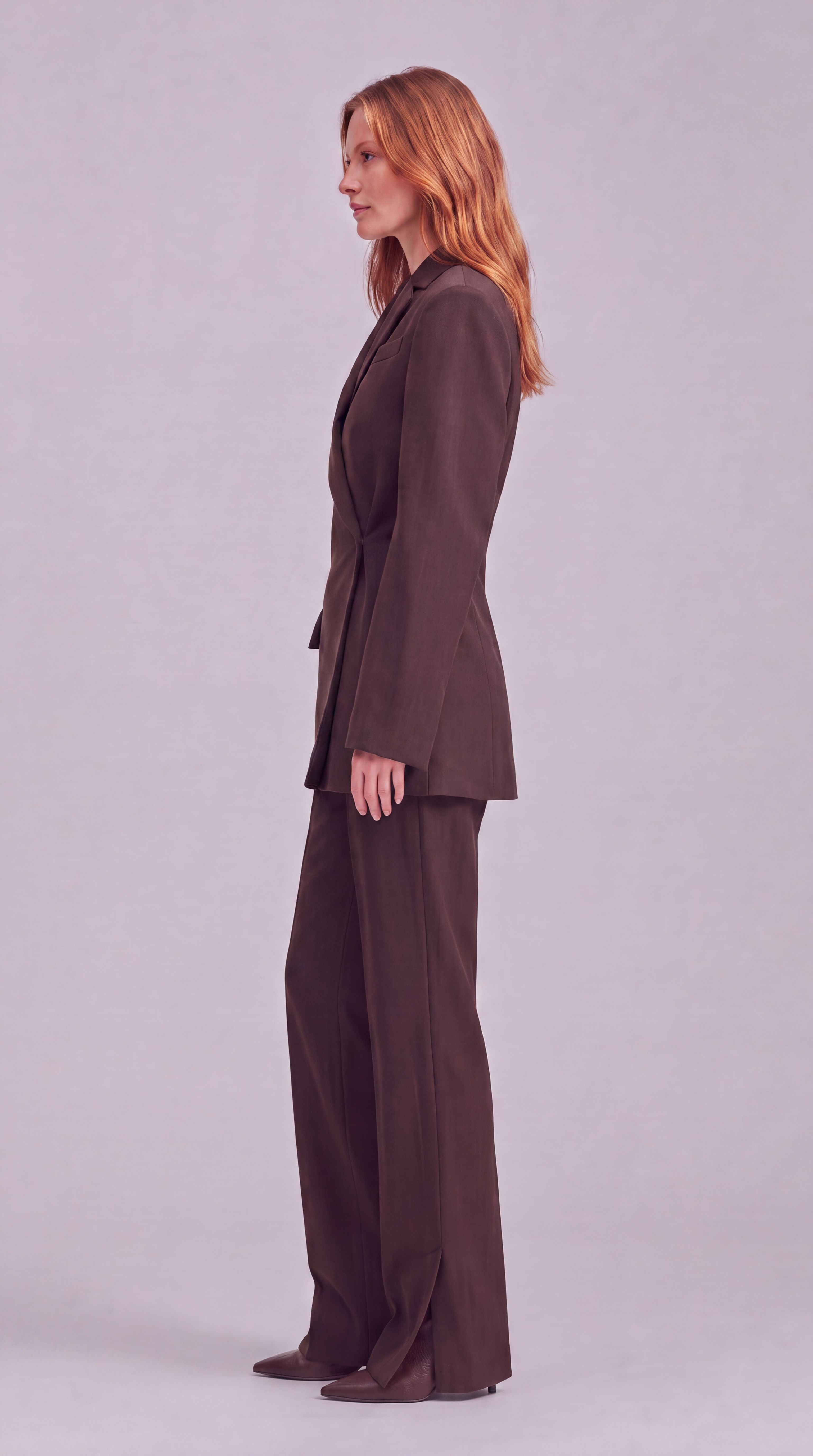 PRE-ORDER | Chocolate brown blazer with an asymmetrical button closure.